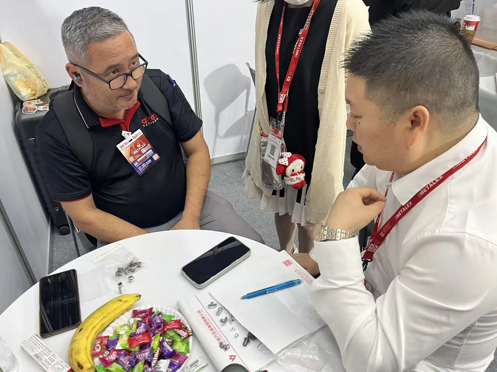 YIWAN team reviewing fastener requirements with a buyer at METALEX